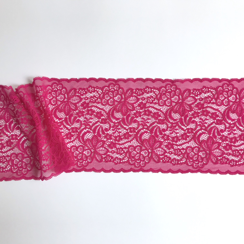 Dentelle galon motif floral coloris rose fuschia