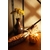 Composition automnale chaleureuse pour table, composée de mini-citrouilles, de maïs indien et de fleurs séchées dans un vase