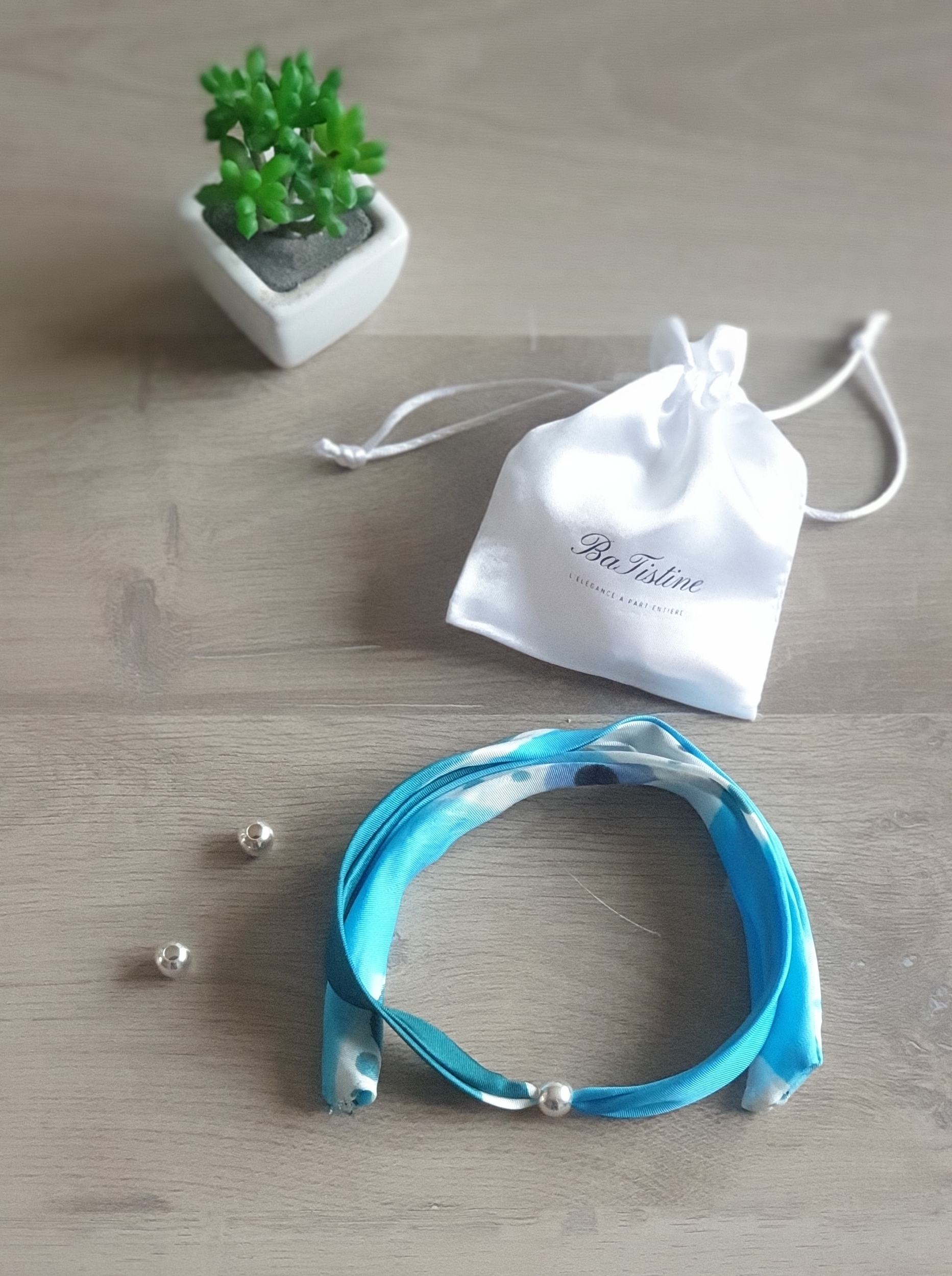 Bracelet Nora boule argent à plat 1