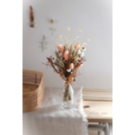 vase en verre et fleurs séchées