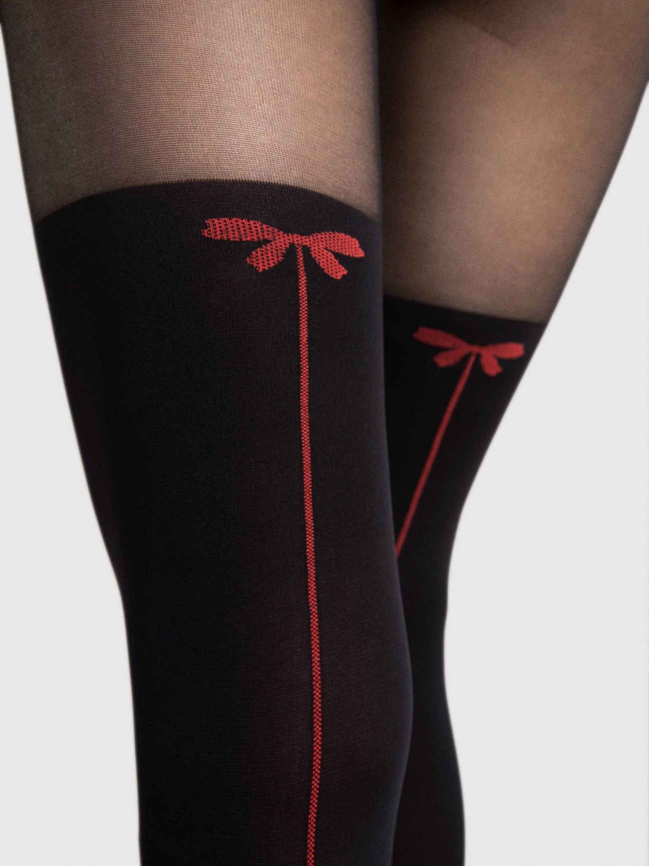 noeud rouge sur collant fiore