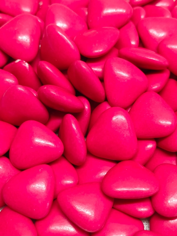 Dragées coeur chocolat lait couleur rouge framboise