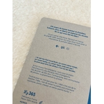 Dos du carnet décriture feel good fourni avec le protège-carnet en cuir