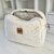 trousse naissance sur mesure en teddy bouclé écru doublé tissu vintage