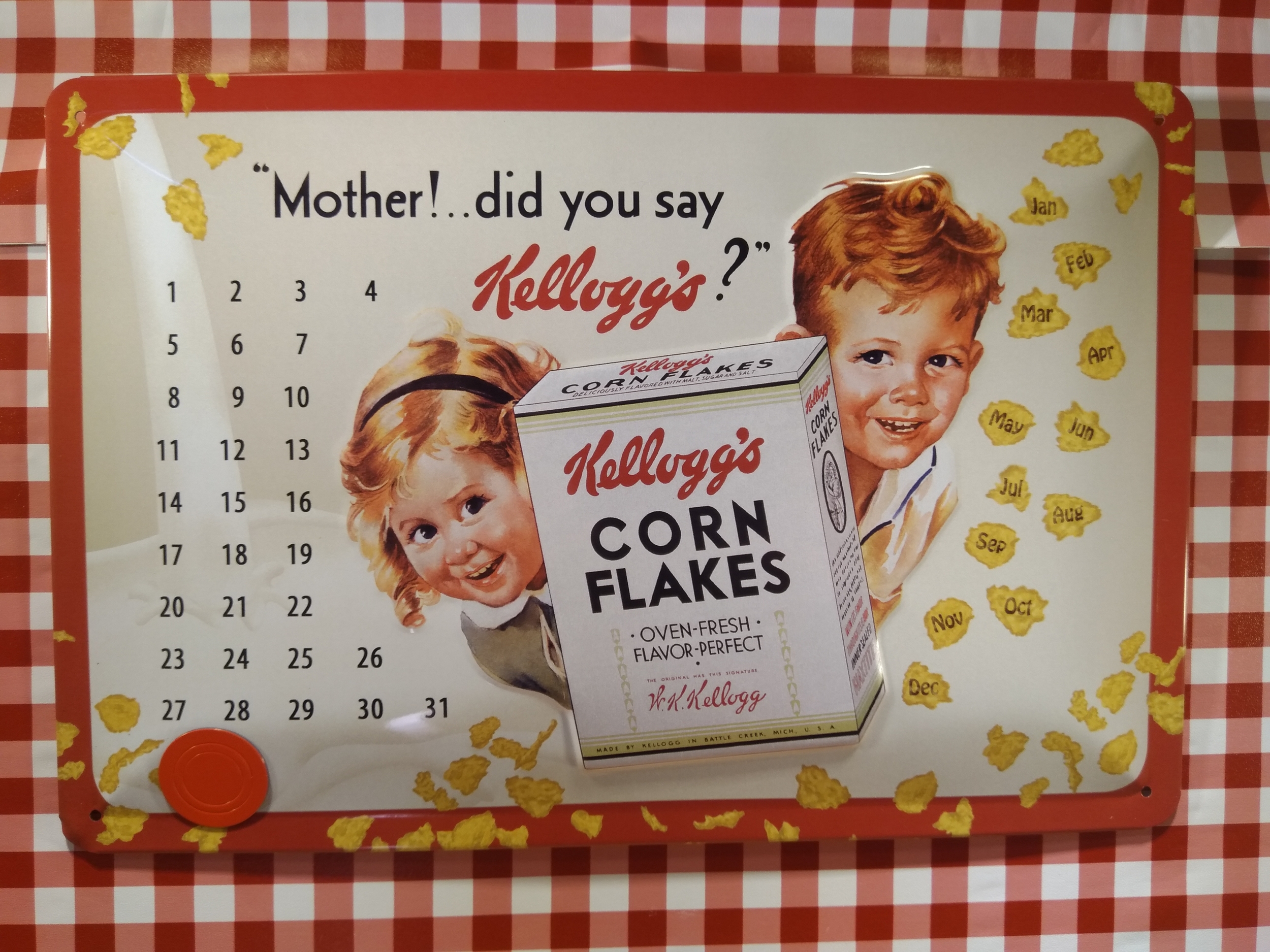 plaque métal calendrier perpétuel publicitaire kelloggs corn flakes