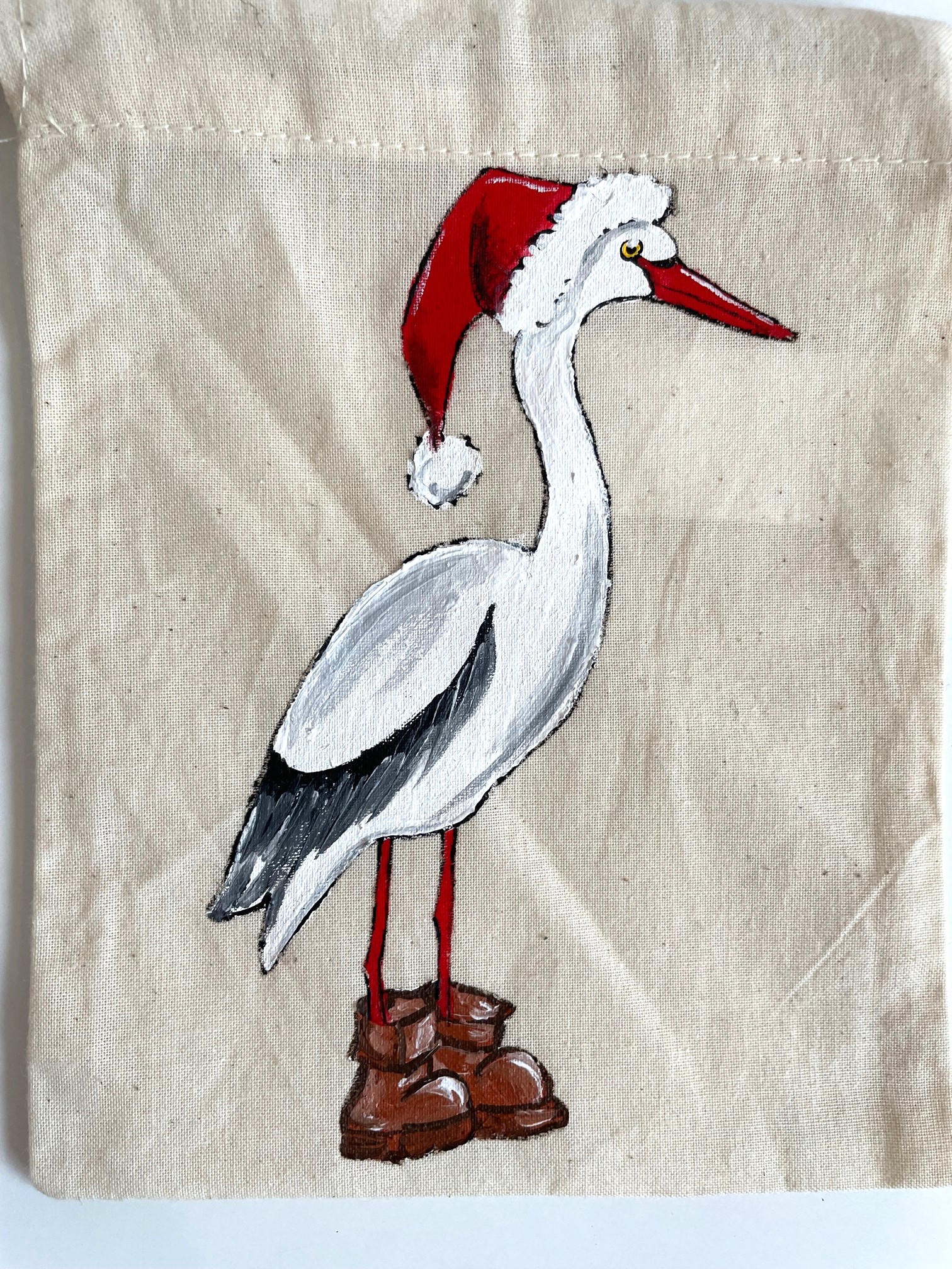 Pochon coton beige cigogne père noël peinte à  la main par Elles et No.