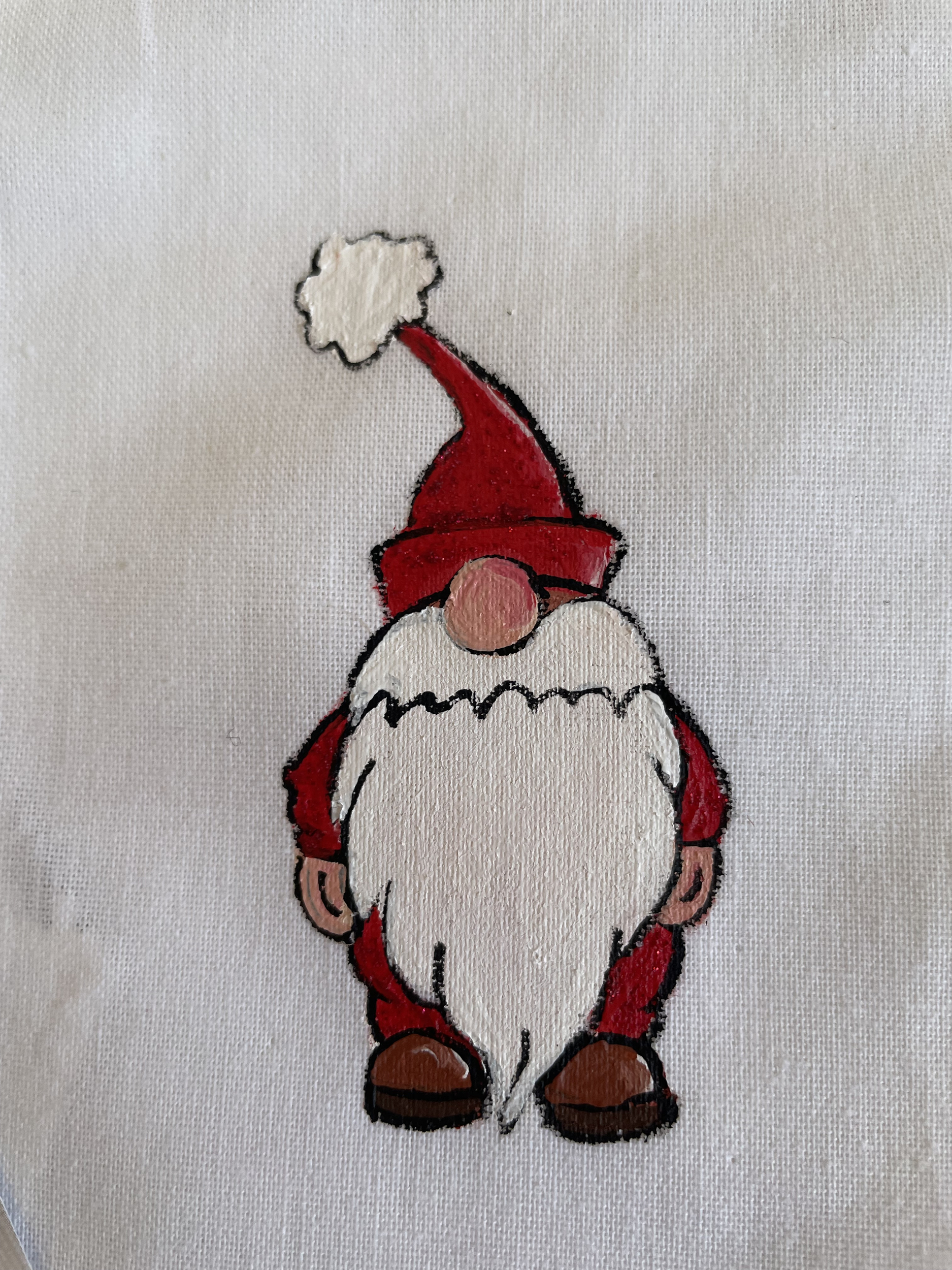 pochon en coton bio avec ruban satin noir avec un lutin de Noël rouge peint à la main par Elles et No.