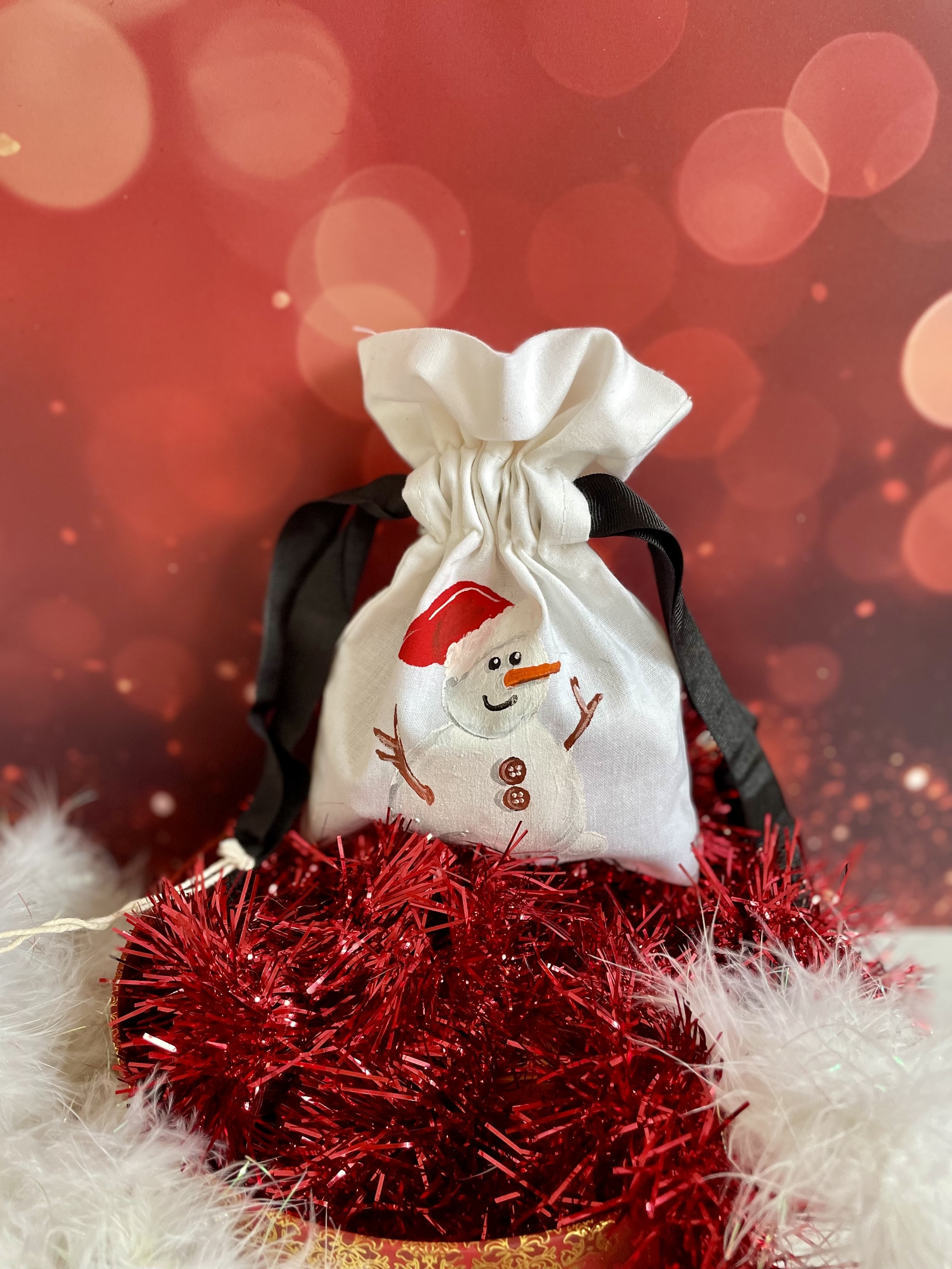 pochon avec bonhomme de neige  de Noël peint à la main par Elles et No.