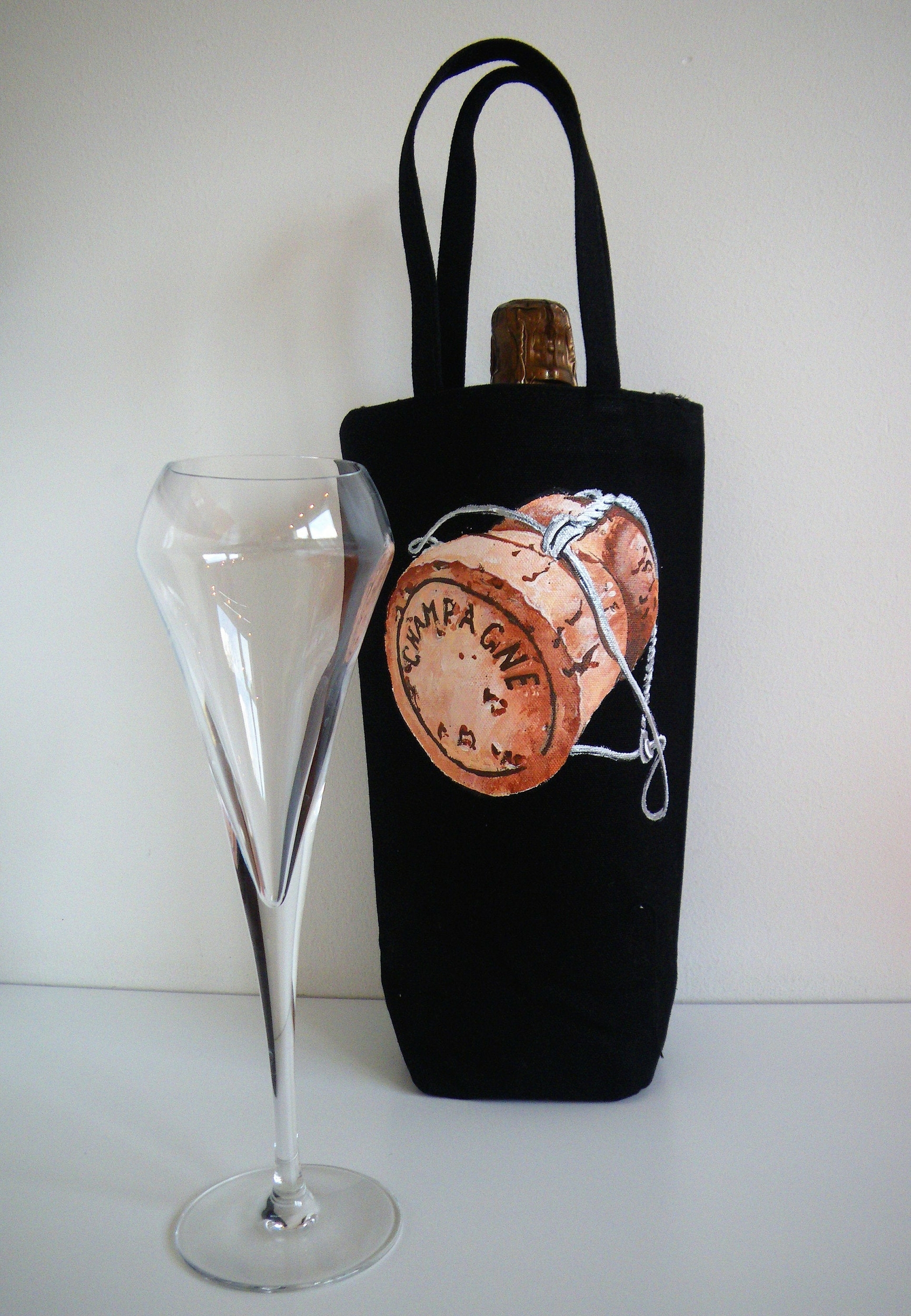 sac à bouteille avec bouchon champagne
