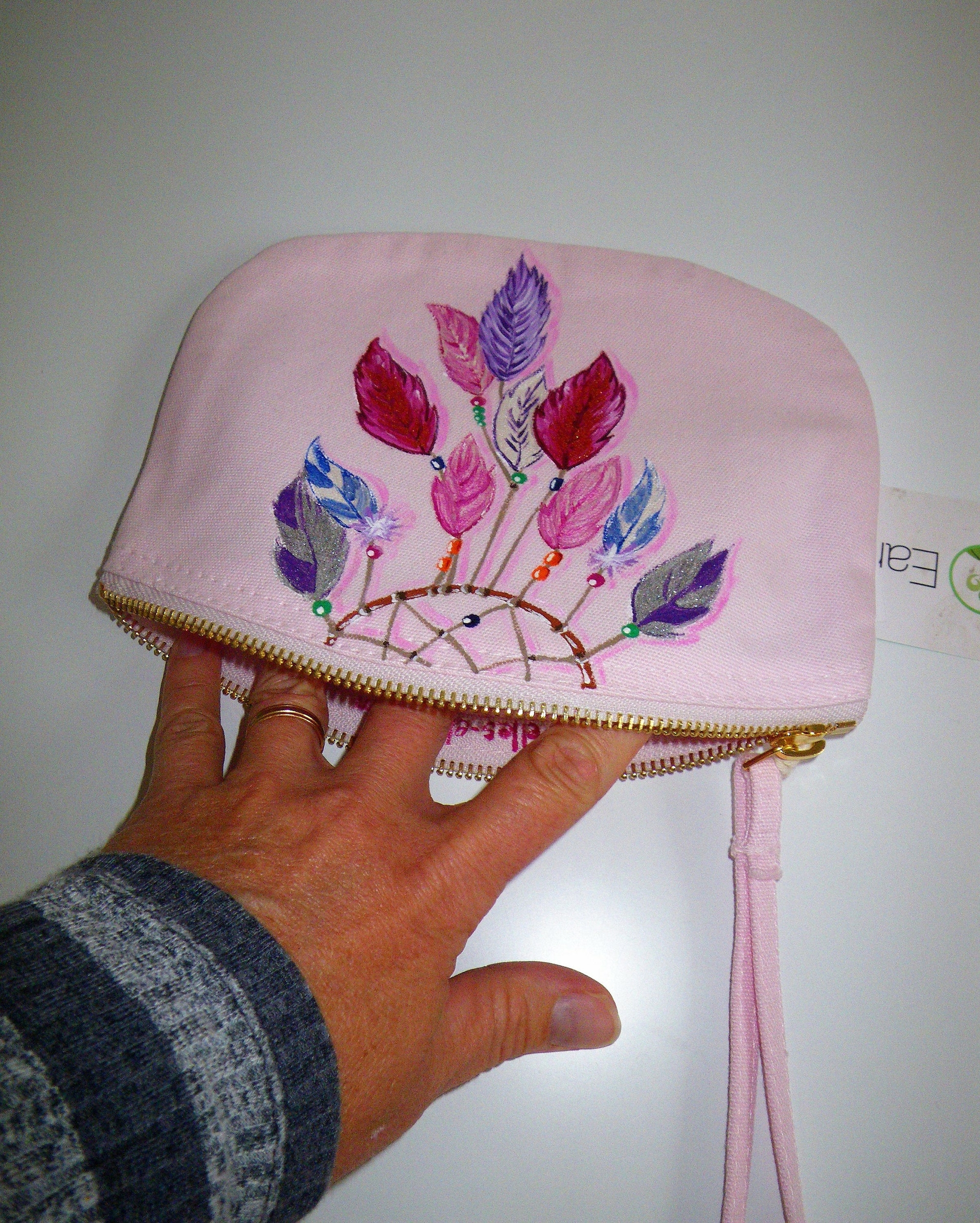 trousse à lanière rose avec attrape-rêves