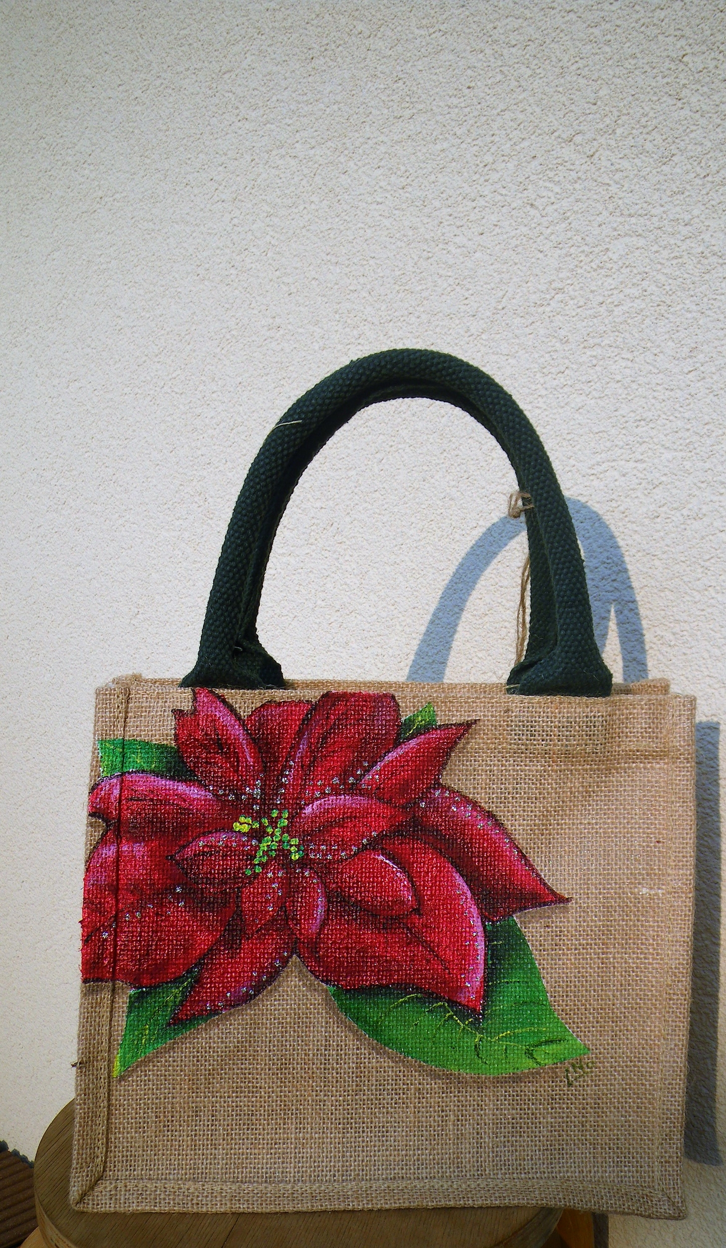 sac en jute avec poinsettia