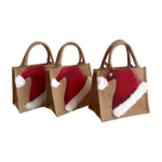 Petit sac jute avec bonnet de père Noël peint à la main par Elles et No.