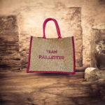 Sac en jute avec le message "team paillettes" peint à la main à la couleur pailletée par Elles et No.