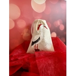 pochon en coton avec une cigogne portant un chapeau de Père Noël peinte à la main par Elles et No.