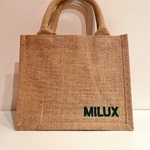 sac en jute avec logo chaîne dhôtelleries de luxe peint à la main par Elles et No.