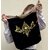 sac à main en coton bio noir et un bouton pression avec une fleur de lotus dorée peinte à la main par Elles et No.