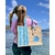 Collection Capsule Bayadère sac de plage avec des rayures bleues style Bayadère et un coquillage peints à la main par Elles et No Présenté porté à la plage