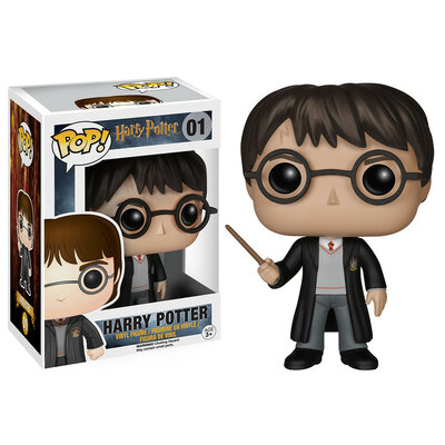 Funko POP! Harry Potter n°01 en uniforme de Poudlard dans sa boîte-fenêtre