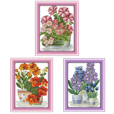 3 toiles : composition florale rose, orange et violet