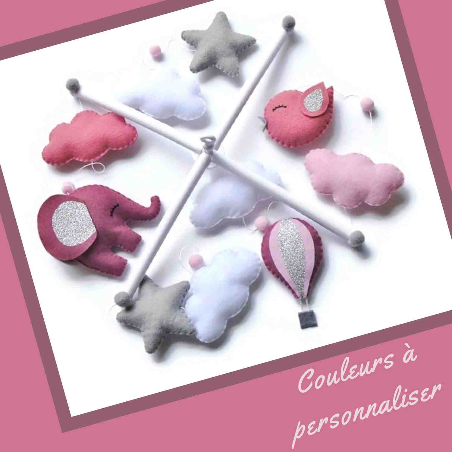 mobile bébé decoratif chambre fille vieux rose. deco elephant et montgolfière. motifs nuage et étoile