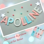 guirlan deprénom personnalisée en tissu au choix pour decoration chambre bébé rose et bleu