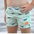 maillot-de-bain-enfant-vert-clair-motif-baleine-porte-face-125461