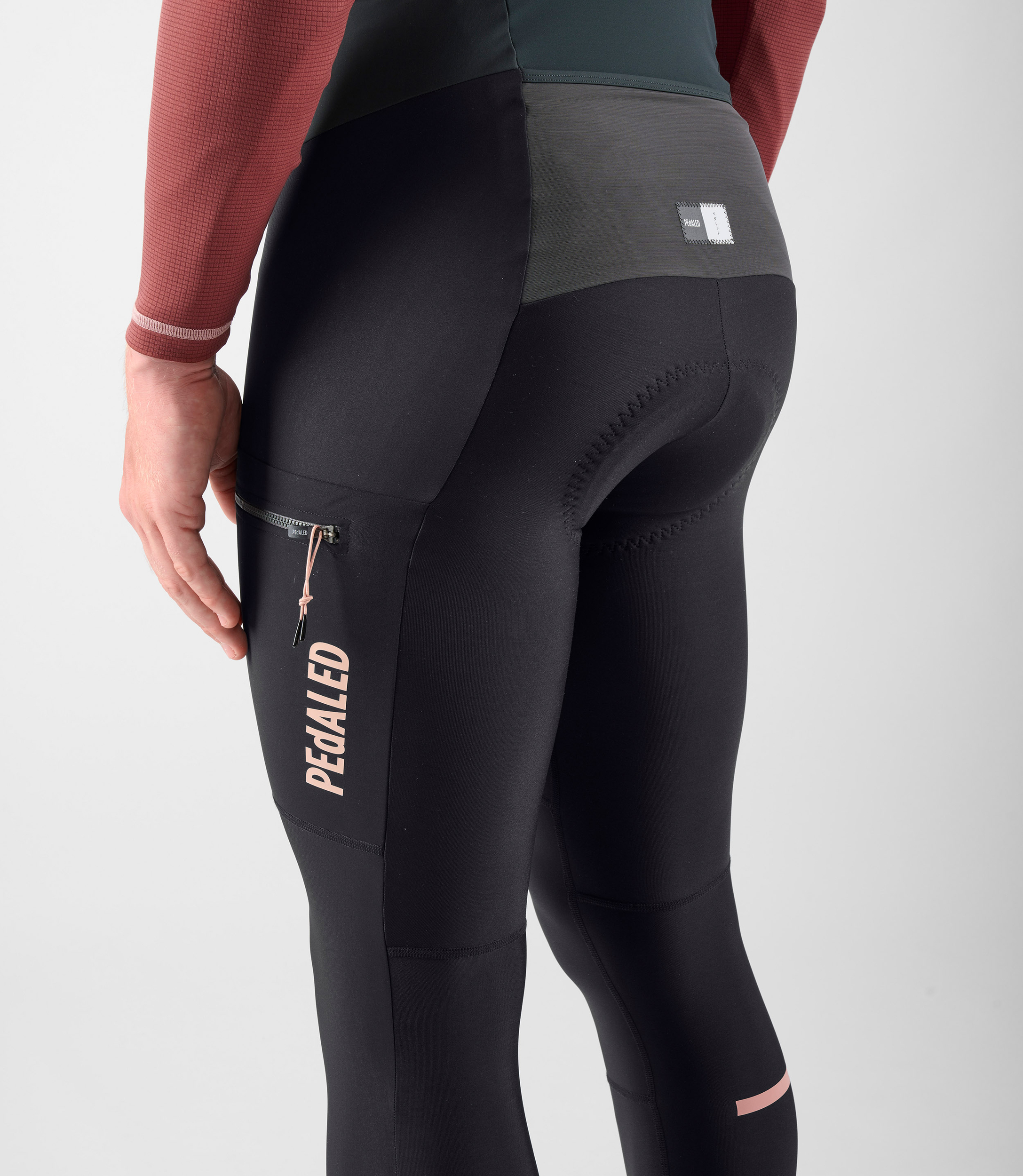 men-cycling-cargo-bib-tight-back-odyssey-black-zip-pocket-pedaled