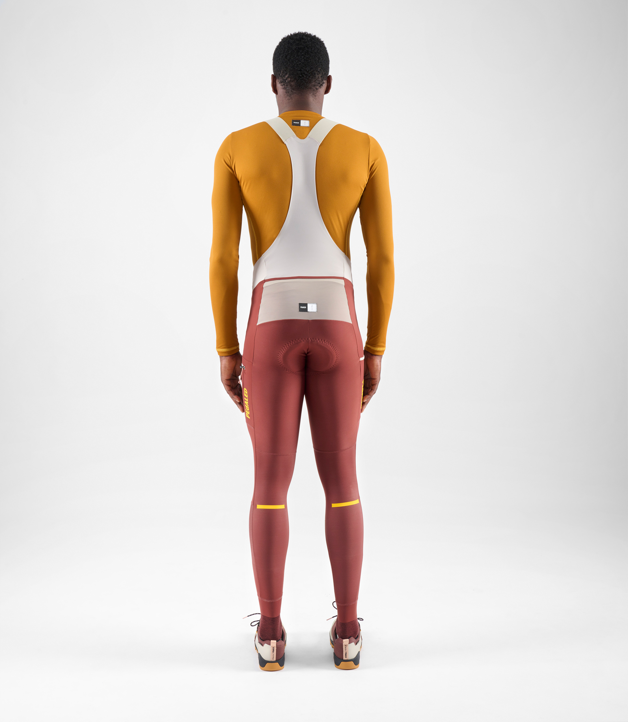 men-cycling-cargo-bib-tight-red-odyssey-total-body-back-pedaled