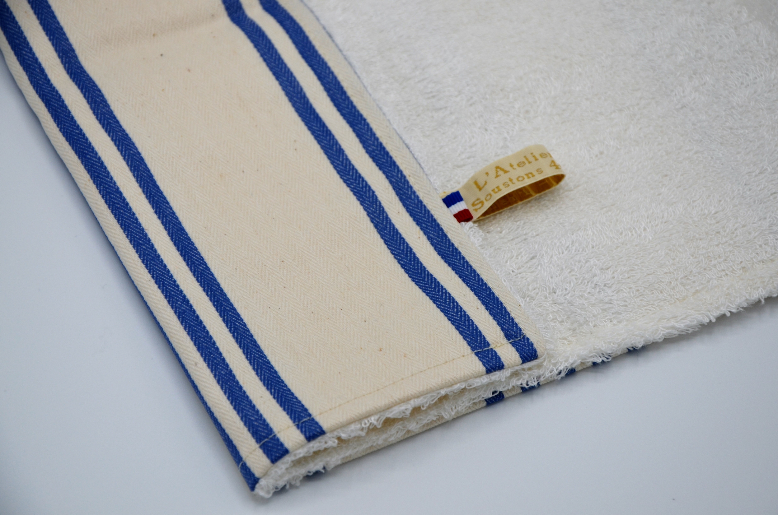 tapis a langer tissu basque enduit beige bleu eponge bambou ecru