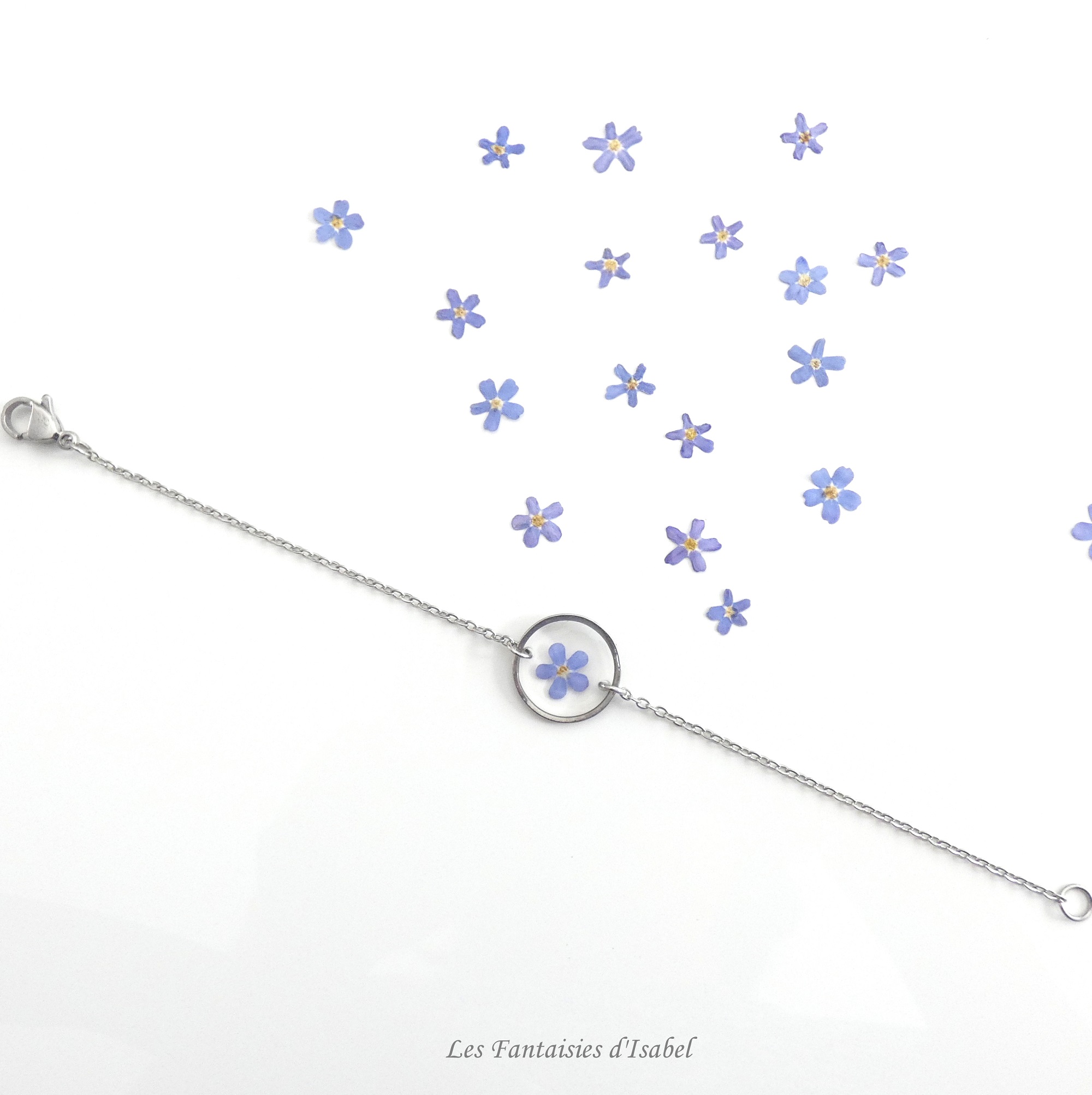 57-bracelet rond acier inox fleur myosotis bleu artisanal landes