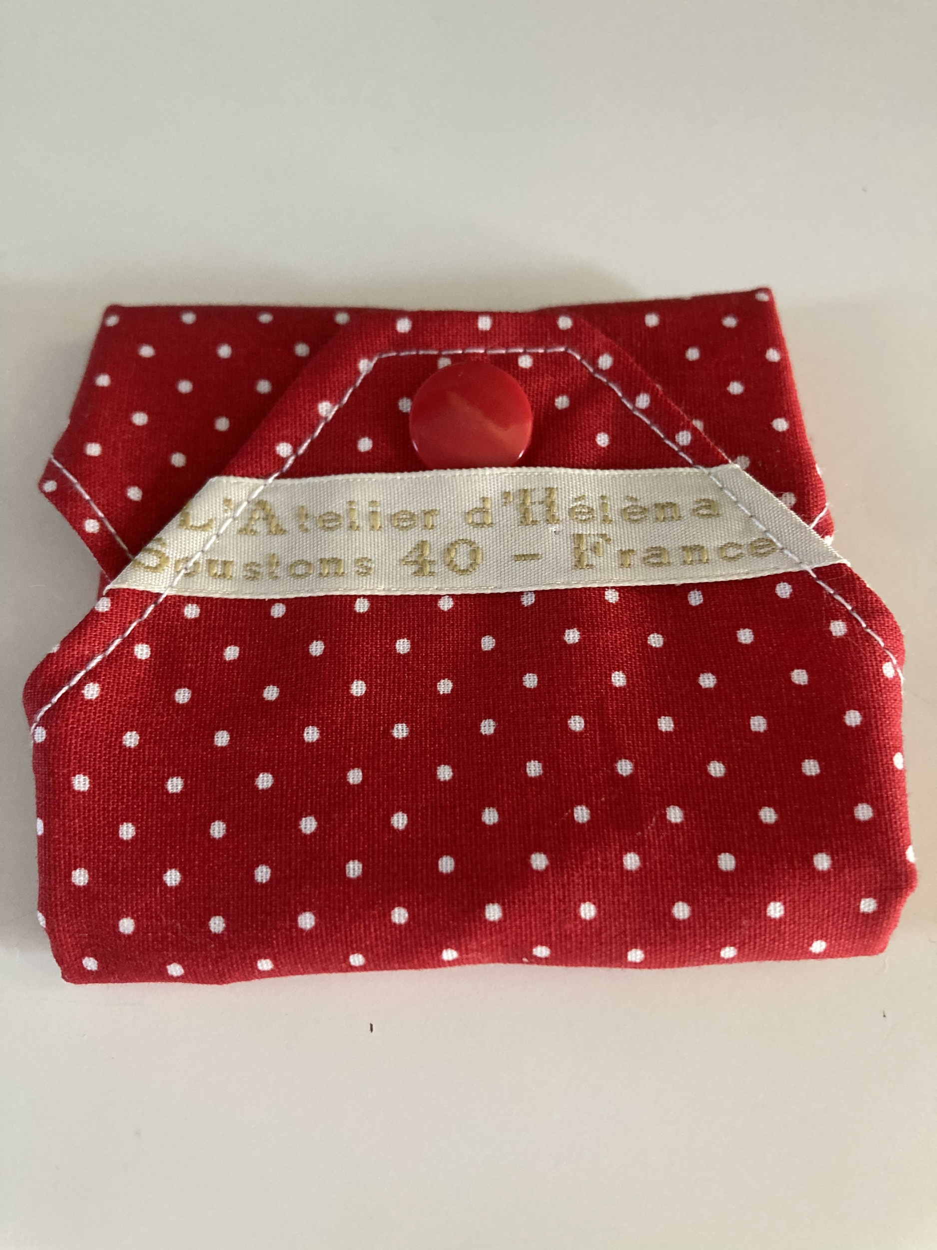 protege slip lavable  pois rouge
