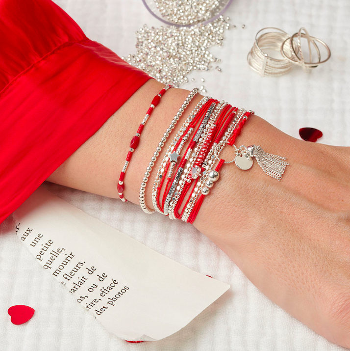 COMPOSITION POIGNET ROUGE POMPON