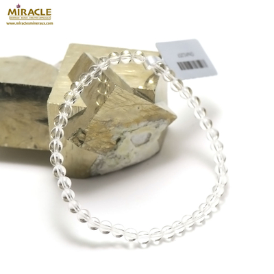 Bracelet cristal de roche , "perle ronde 4 mm"