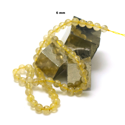 fil de 39 cm 63 perles de quartz rutile "ronde 6 mm"