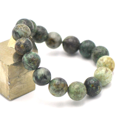 Bracelets double joie et spiritualité, en pierre naturelle de turquoise  d'Afrique et de pierre de lave (roche volcanique - Bijoux homme - Miracles  minéraux