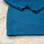 disana-aran-gilet-pull-pure-laine-merinos-tricotée-bebe-enfant-maison-de-mamoulia-pacific-turquoise-bleu