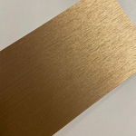 inox-doré-or-brossé-alu-doré-film-adhesif-revetement-autocollant-mur-meuble-surface.echantillon-photo