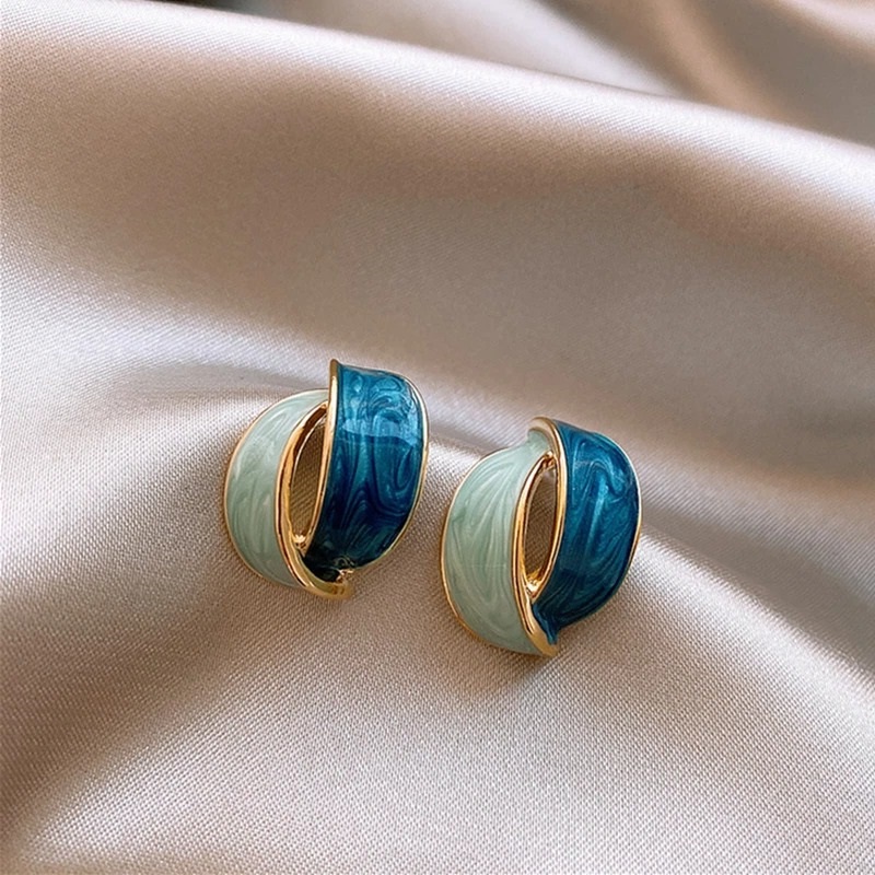 Boucles doreilles croisée femme