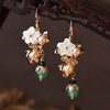 Nouveau-boucles-d-oreilles-pour-femmes-la-main-fleurs-chinoises-gland-bijoux-balancent-boucles-d-oreilles