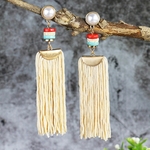 boucle d oreille beige pampilles