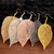 Boucles d oreilles  en forme de feuille pendante