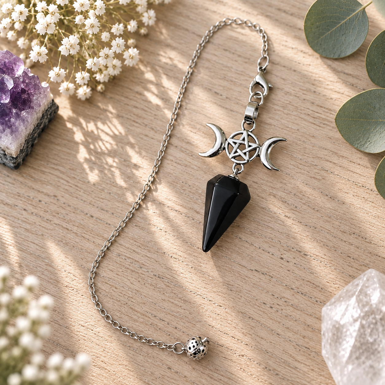 pendule-triple-lune-en-obsidienne-noire