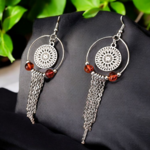 boucles doreilles acier et pierres