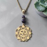 collier-doré-om-charme-sonorite.jpg