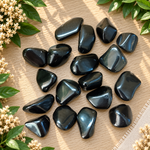 Pierres roulées d’Obsidienne Œil Céleste noires aux reflets irisés – 5 à 8 g