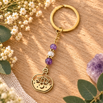 Porte-clés doré lotus Quintessence avec lune et pierre naturelle