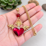 collier-coeur-aile-ardeur-charme-amour-tenue-en-main
