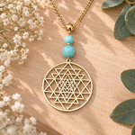 collier-doré-sri-yantra-charme-sens