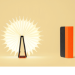 LUMIO mini LITO lampe livre noir orange posé ouvert 360° cosmo