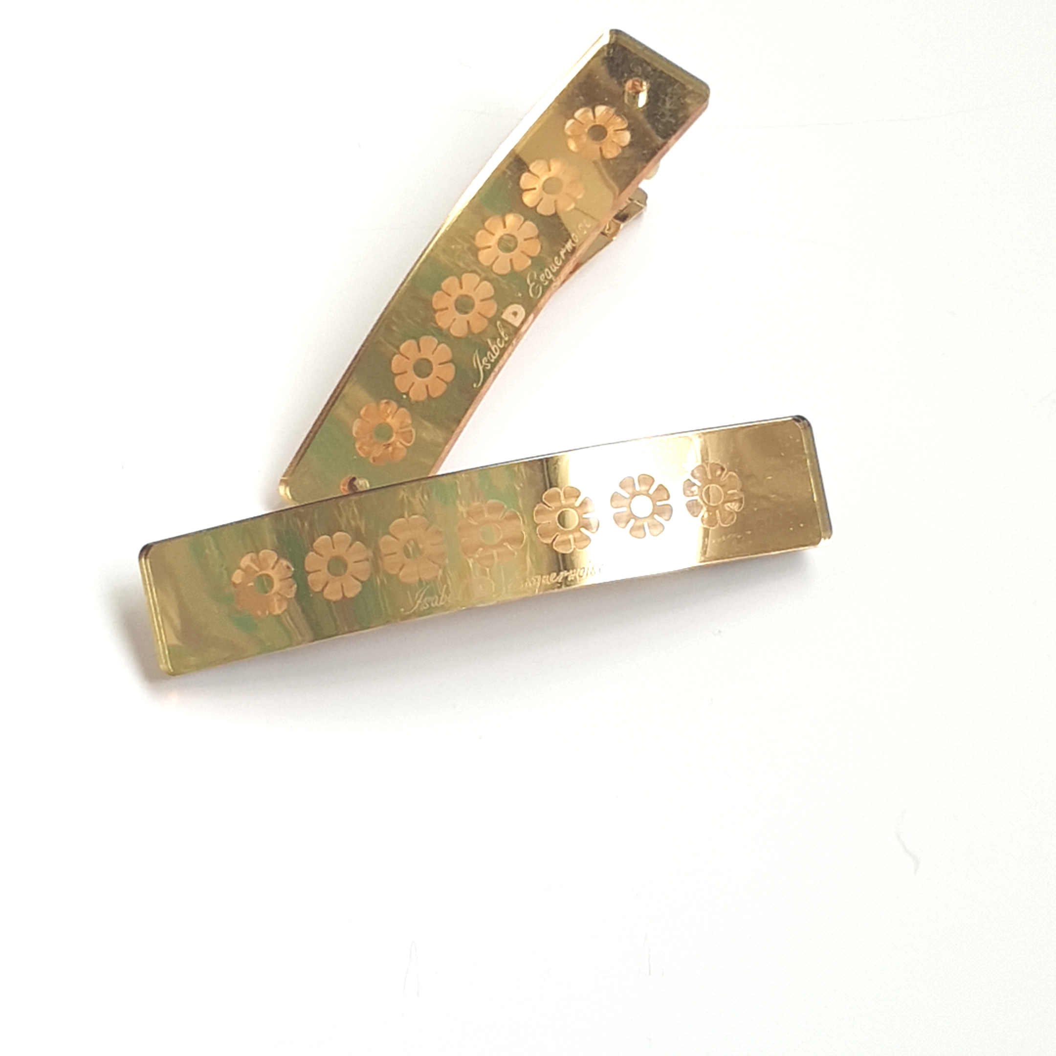 barrette glossy or clistal à fleurs